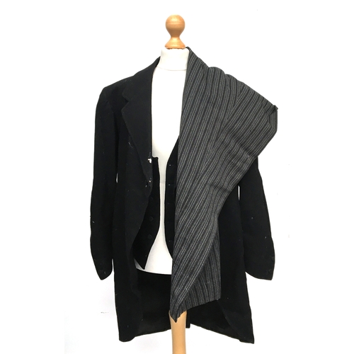 624 - A gent's morning suit, as found, with black waistcoat and striped trousers