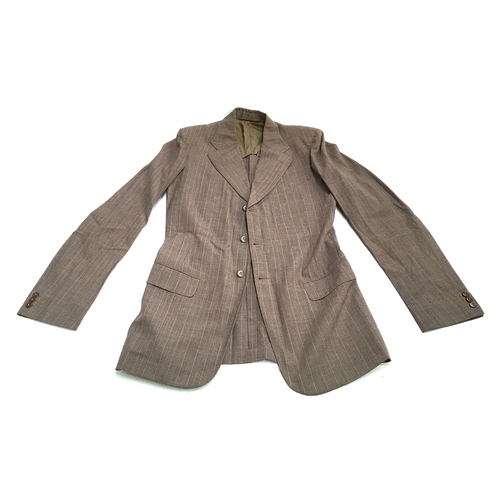 631 - A tailored gent's two piece suit by Kwon Fook Wing, single breasted jacket, 40