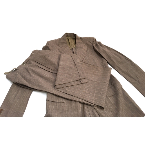 631 - A tailored gent's two piece suit by Kwon Fook Wing, single breasted jacket, 40