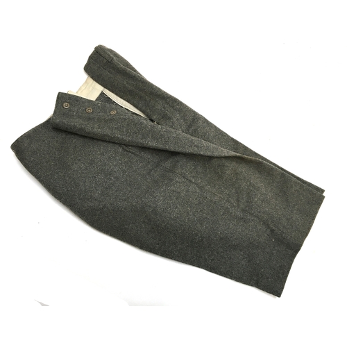 632 - Two pairs of tweed shooting breeks with button flies, together with one pair of grey flannel shorts