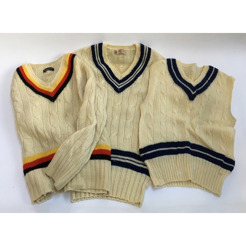 637 - Two vintage cricket jumpers, one by Beale & Inman, London; together with a sleeveless cricket jumper... 