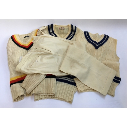 637 - Two vintage cricket jumpers, one by Beale & Inman, London; together with a sleeveless cricket jumper... 