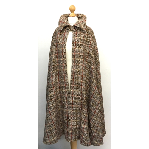 546 - An Alexon ladies tweed style cape; together with a Leslie Lawrence faux fur coat, with belt (2)