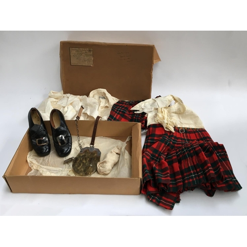 502 - A 1960’s Harvey Nichols & Co. Ltd box containing children's Scottish dress, to include silk shirts b... 