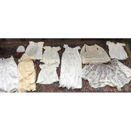 522 - A mixed lot to include christening gowns, bonnet, lace shawl, etc