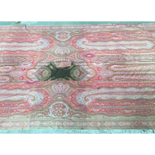 511 - A very large paisley shawl, 315x140cm; together with a tapestry, 47x69cm (2)