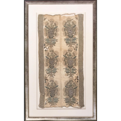 518 - A panel of Eastern early 19th century textile, embroidered muslin in silver thread, depicting bunche... 