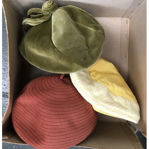 505 - A square Harrods hat box containing three 1960s day hats