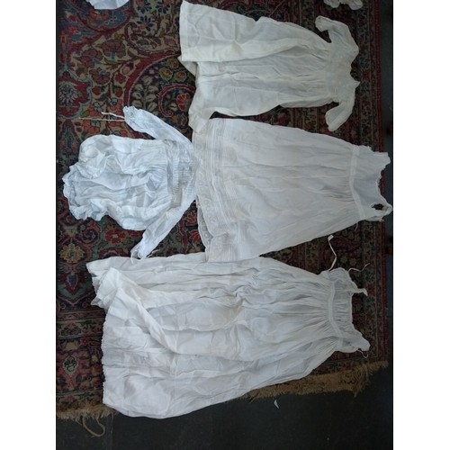 480 - A large quantity of christening gowns, some early