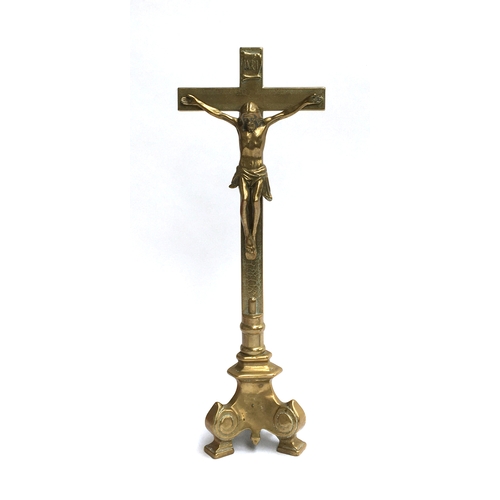 172 - A brass figure of Jesus on the cross, 44.5cmH