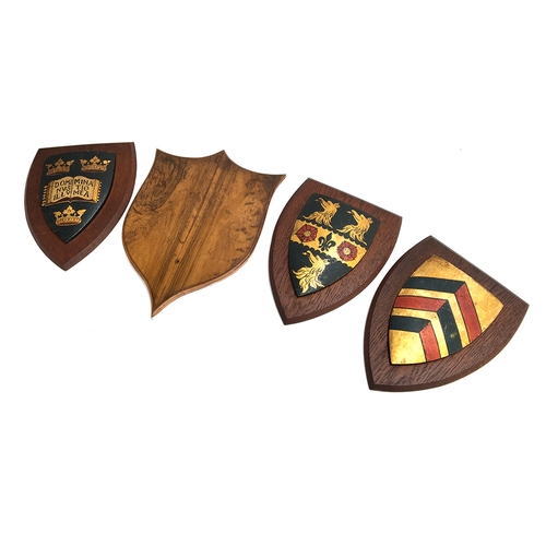 183 - Three hand painted wooden shields, one the Oxford University crest, each 30cmH; together with a vaca... 