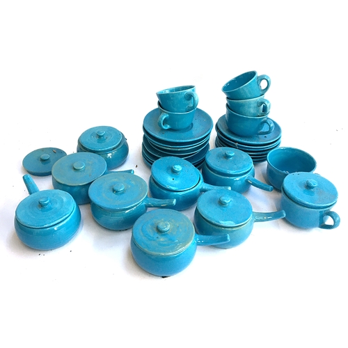 56 - A lot of continental blue ceramics to include cups and saucers, lidded ramekins, pots etc