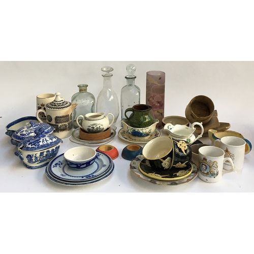 58 - A mixed lot of glass to include several decanters, studio glass, Portmeirion Williams-Ellis jug, woo... 