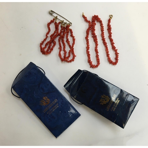 8 - A coral necklace with yellow metal clasp, 50cm long, together with three small bracelets, retailed b... 