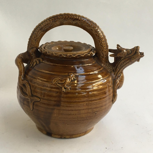 124 - A large Chinese dragon-handled pottery teapot