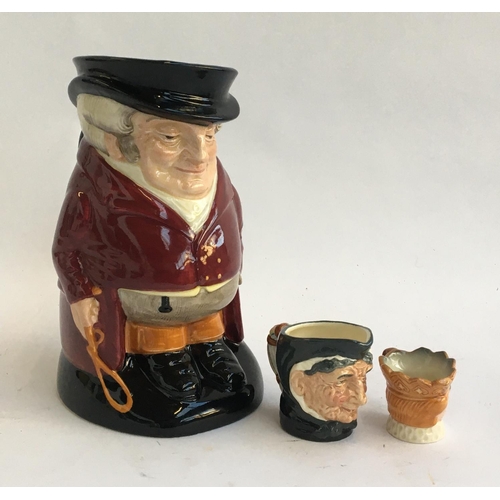 125 - Three Royal Doulton character jugs, including 'The Huntsman', 'Old King Cole', and 'Granny'