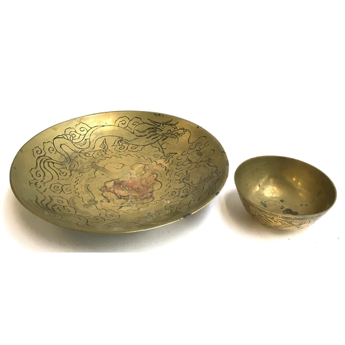 40 - A Chinese brass bowl with dragon design interior, 27cmD; together with a smaller Chinese brass bowl,... 