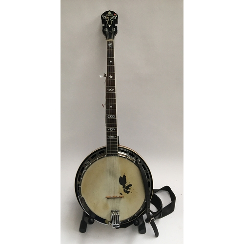 132 - A Japanese five string Yoshi banjo, in soft case