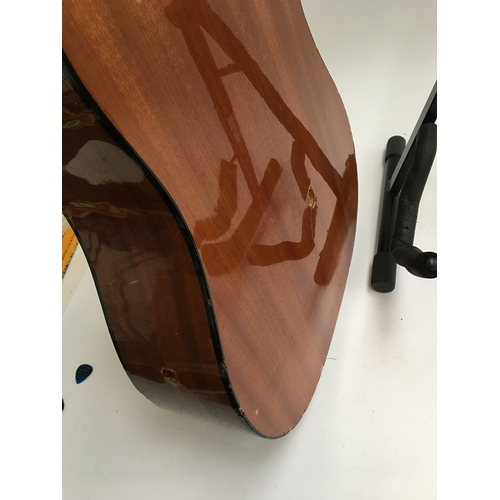 137 - An Eko acoustic guitar, model Grande VI (some damage), in soft case