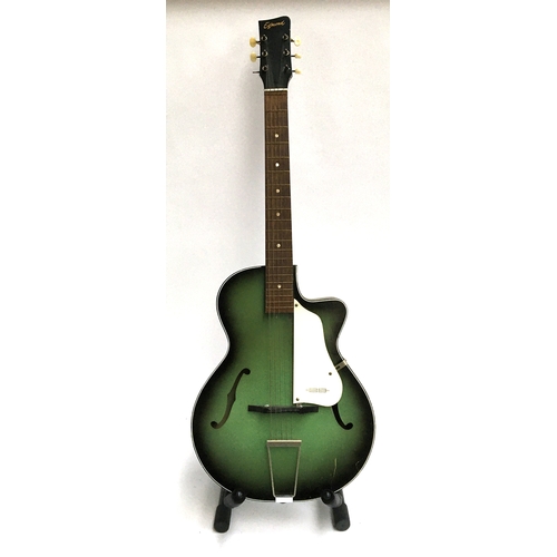 143 - A Egmund 'Green Sunburst' acoustic guitar with cutaway and f holes, in vintage hard case
