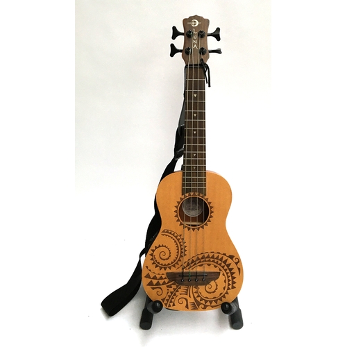 144 - A Luna electro-acoustic bass ukulele, in a Luna Ukes soft case