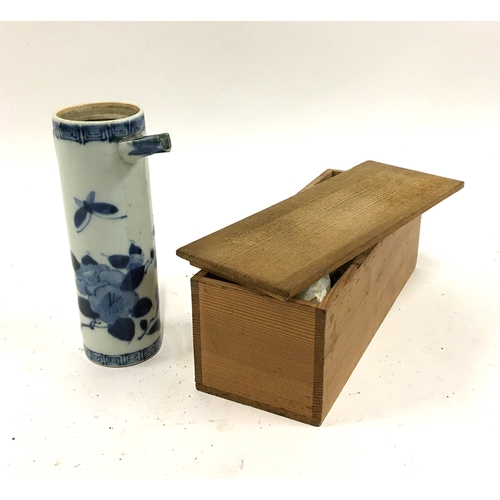 29 - A small Japanese teapot, blue and white with floral design, in wooden box, 16.5cmH