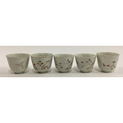 37 - A lot of five Japanese sake cups, white with cherryblossom design, each approx. 4.5cmH
