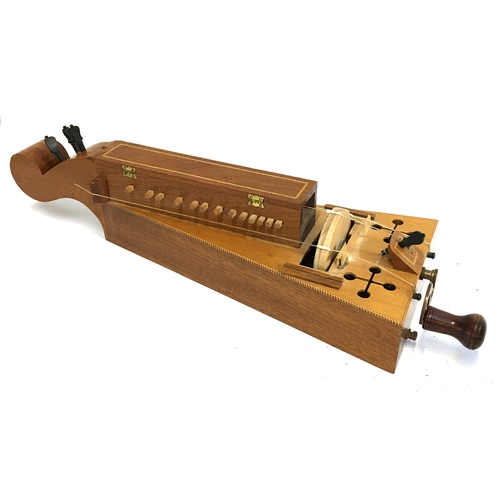 152 - A three string Hurdy Gurdy, the body 56cmL