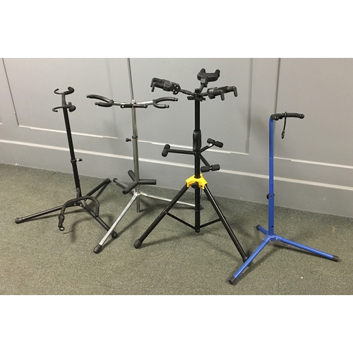 164 - A further set of four multiple instrument guitar stands