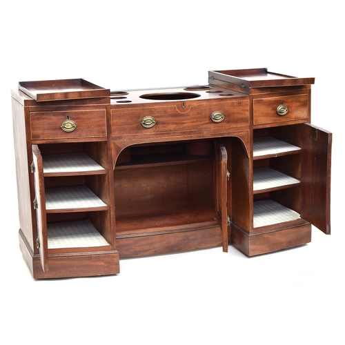 554 - A Regency bowfronted dressing table washstand, double hinged top revealing compartmented interior fo... 