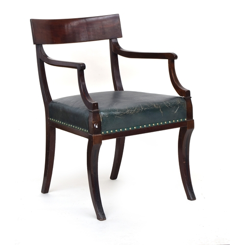 615 - A Regency mahogany open armchair inlaid with ebonised lines with curved toprail and padded seat cove... 