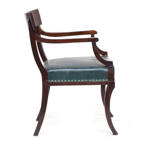 615 - A Regency mahogany open armchair inlaid with ebonised lines with curved toprail and padded seat cove... 