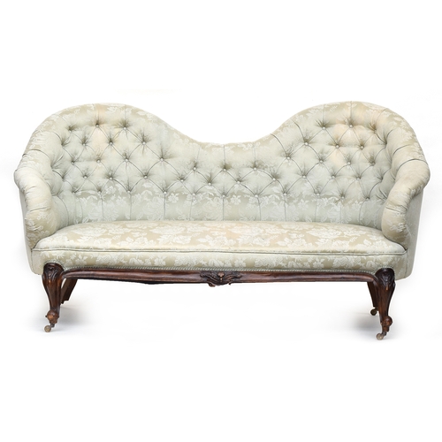 627 - A 19th century French walnut button back bucket end sofa, on acanthus carved cabriole legs on caster... 