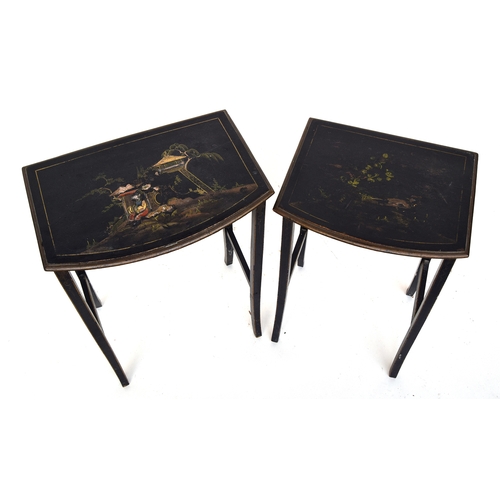 595 - A nest of two black Japanned occasional tables, depicting oriental scenes, the larger 45cm wide, 32c... 