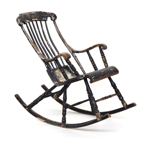 614 - A 19th century ebonised and parcel painted rocking chair, in need of some restoration

Provenance: F... 