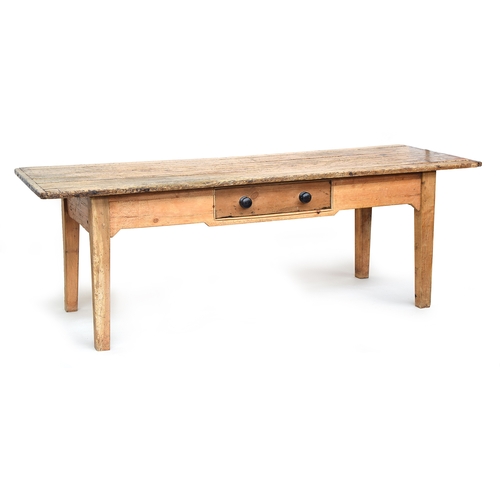 609 - A 19th century French pine farmhouse table, plank top with cleated ends, single large drawer, on squ... 