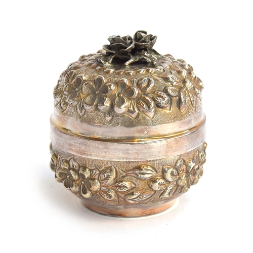 79 - A Continental 900 silver lidded pot, chased with flowers and foliage, approximately 12cm high, 9.4oz