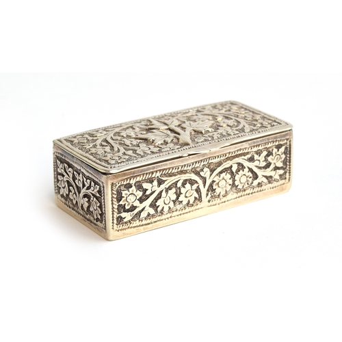 110 - A late 19th century Middle Eastern white metal snuff box, rectangular with chased design of scrollin... 