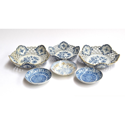 212 - Three Meissen blue and white 'Blumen' pattern baskets with pierced lattice borders, the two larger 2... 