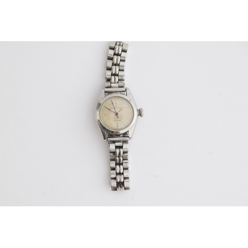 34 - A Rolex Oyster ladies stainless steel wrist watch, the dial with baton markers on quarters, screw do... 