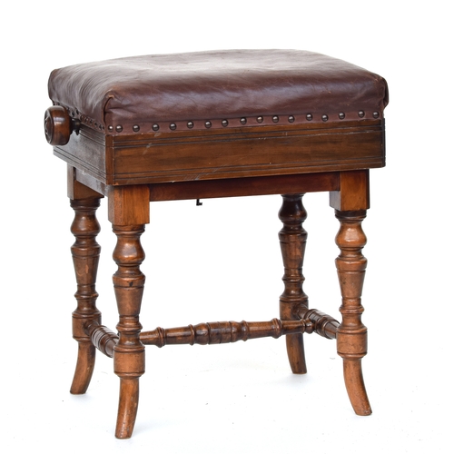 618 - An early 20th century adjustable piano stool, leather upholstered seat on turned legs, 43cm wide