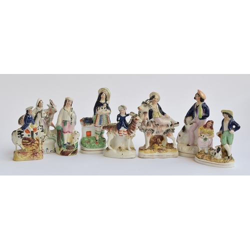 201 - A collection of 19th century Staffordshire flatbacks depicting figures with animals, to include the ... 