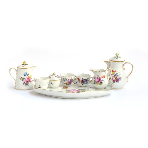 228 - A Meissen part tea service, c. 1924, comprising teapots, teacups, lidded sugar bowl, milk jug and tr... 