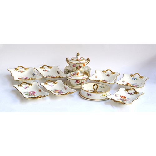 230 - An early 19th century Swansea part dinner service, with hand painted floral design, heightened in gi... 