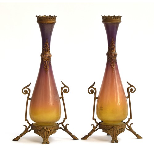 243 - A pair of Jugendstil glass and brass vases, purple and ochre graduating glass, with scrolling enamel... 