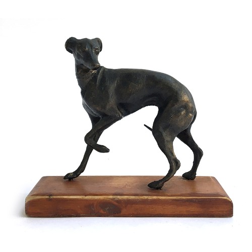 122 - A bronze figure of a whippet, 13.5cmH, on oak base; with one smaller, 4.5cmL