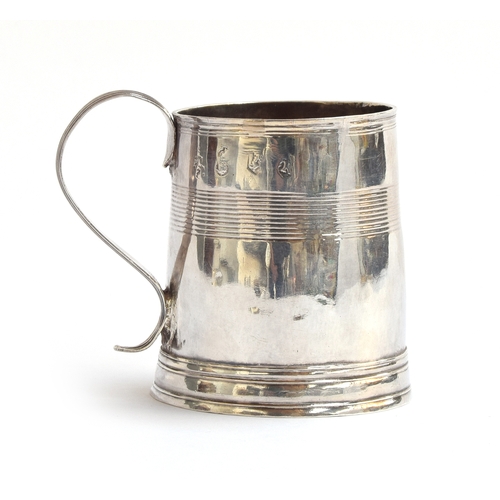 87 - A late 17th/early 18th Century silver mug of tapered cylindrical coopered form, marks rubbed - possi... 