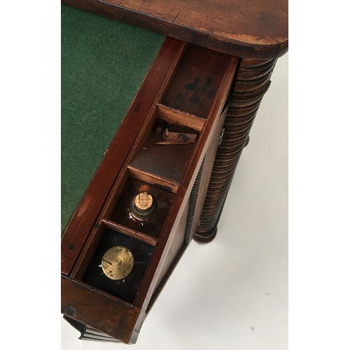 634 - A 19th century chiffonier, the upstand missing, base drawer fitted with writing slope, inkwells, etc... 