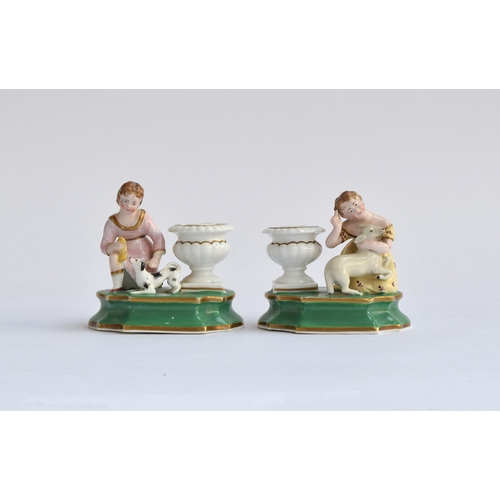 198 - A pair of 19th century Staffordshire Dudson inkwells, in the form of young girls beside an urn, one ... 