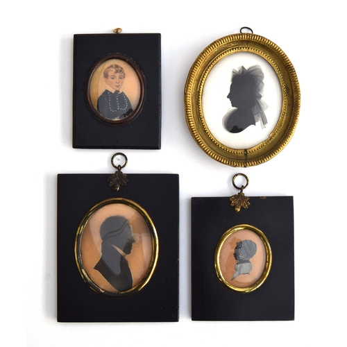 157 - A collection of three early 19th century miniatures in ebonised frames: a watercolour portrait of 'M... 